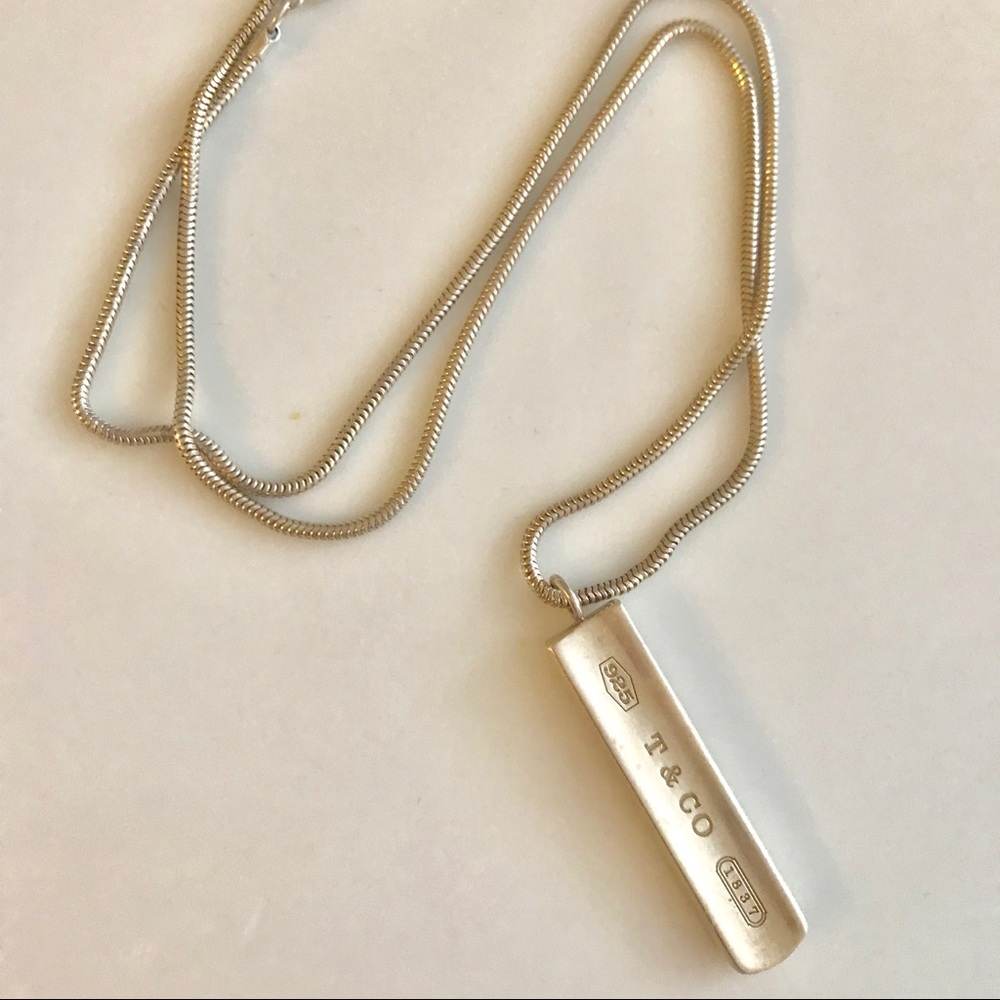 Authentic Tiffany & Co. logo bar necklace.